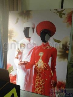 photo booth taking with cut out hole