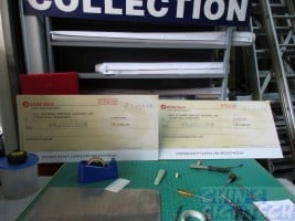 Foam board cheque scanned from real cheque