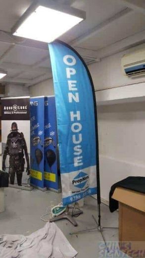 Small feather flag for property advertising - back view