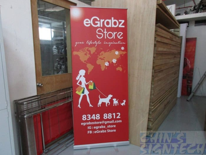 roll up banner with large picture and texts