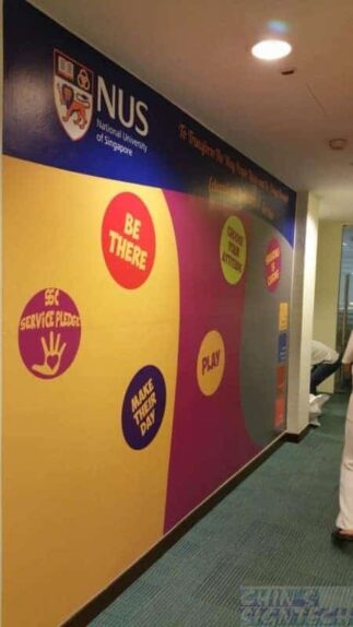 Sticker pasting for NUS wall mural