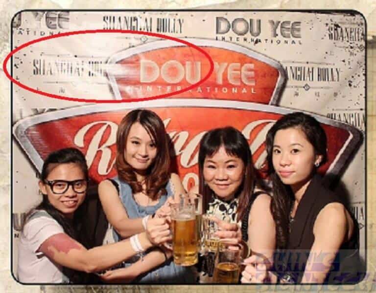 reflection on photo booth backdrop with PVC banner