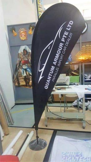 2.2m teardrop banner - Quantum Armour Pte Ltd with custom metal base