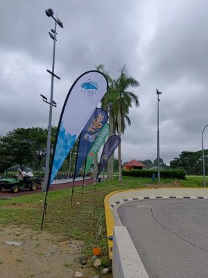 single-sided Teardrop banner on road path