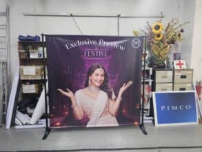 PVC banner on telescopic backdrop stand