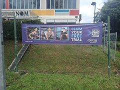 Install PVC banner on banner stand